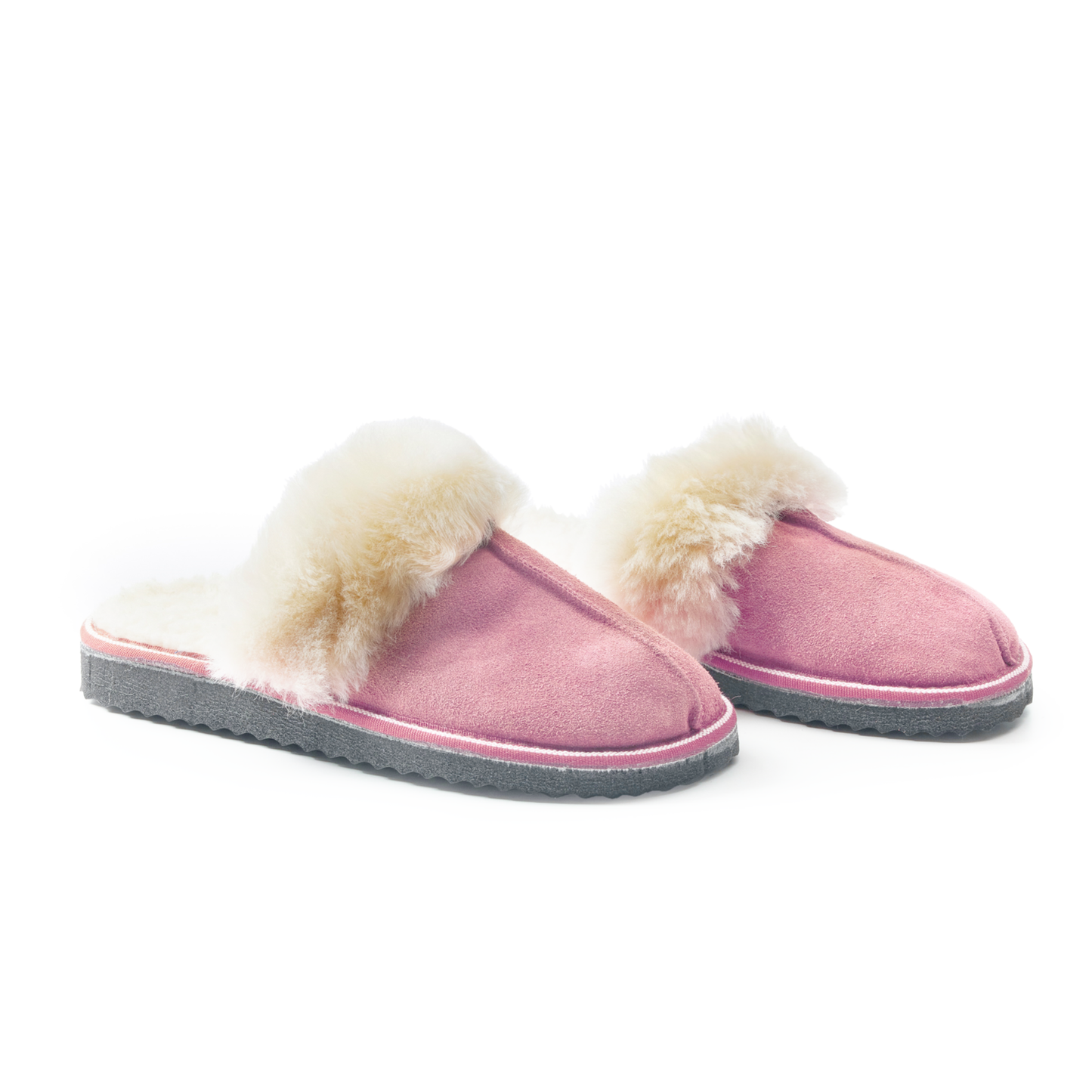 Rosa fårskinnstofflor med vitt ullfoder, varma och mjuka slip-in tofflor för dam, perfekta som innetofflor under vintern.
Pink slipper.